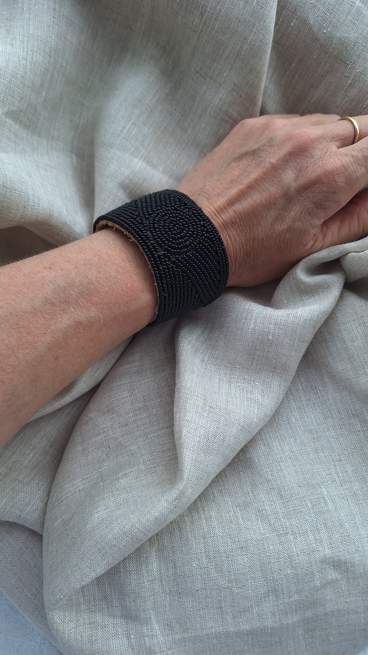 LEATHER BEADED CUFFS