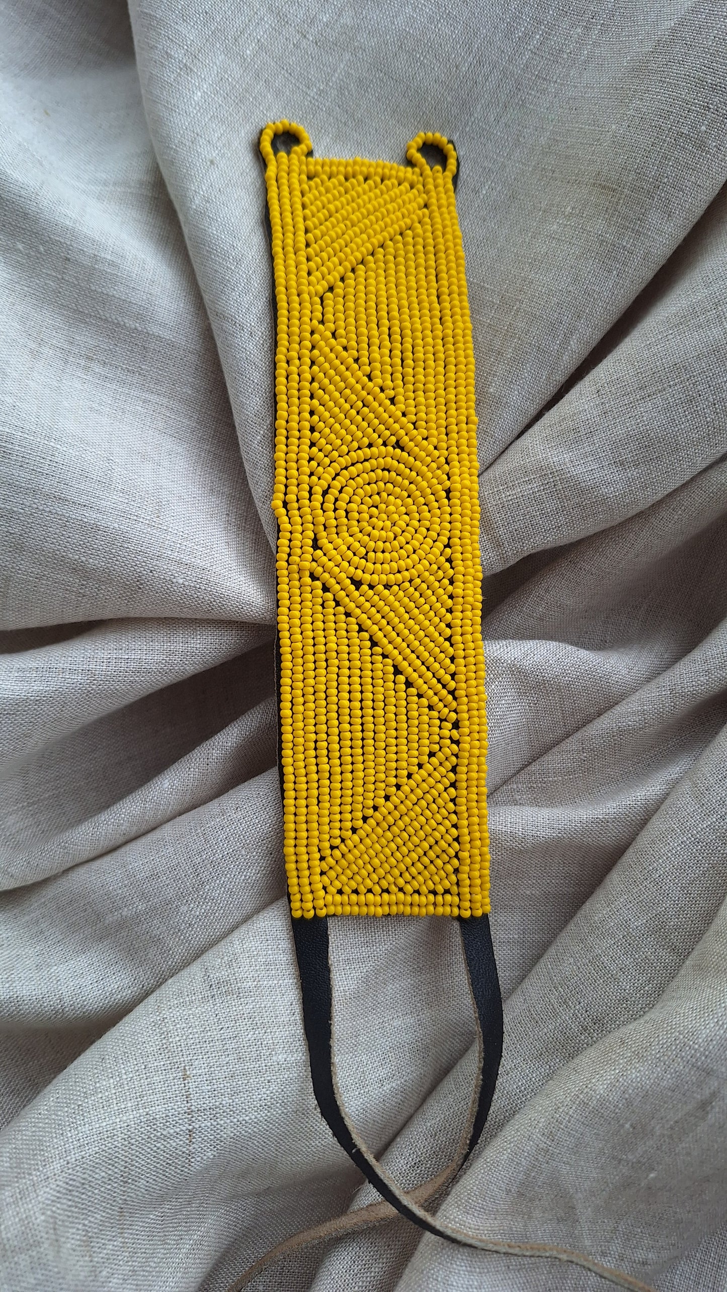 LEATHER BEADED CUFFS